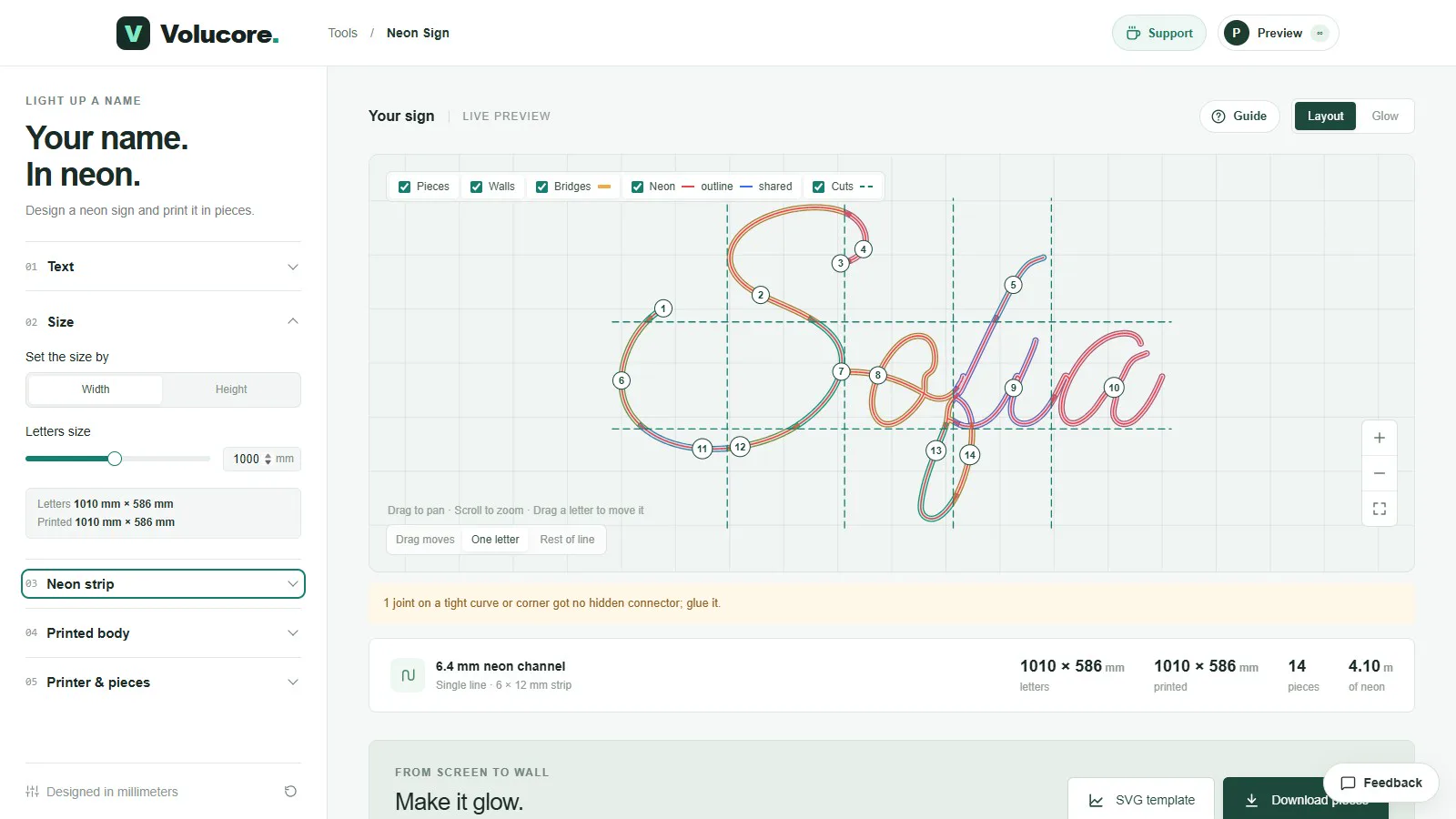 A sign shown in the layout view, divided into 14 numbered pieces with dashed green cut lines.